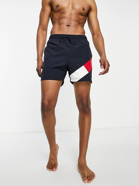 Tommy Hilfiger flag leg logo mid length swim shorts in navy