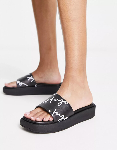 HUGO Emma platform sliders in black with script logo