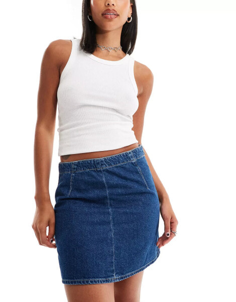 Calvin Klein Jeans mid rise a line darted mini skirt in mid wash