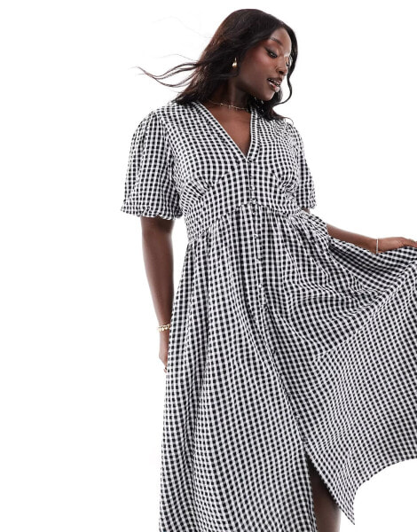 Nobody's Child Plus Starlight puff sleeve midi dress in black and white gingham