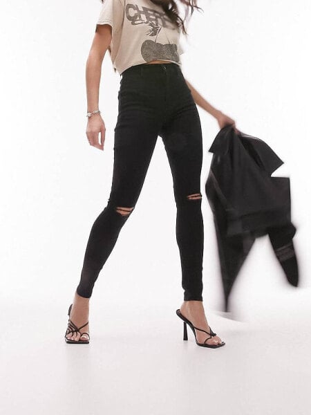 Topshop – Joni – Jeans in Schwarz mit Knierissen