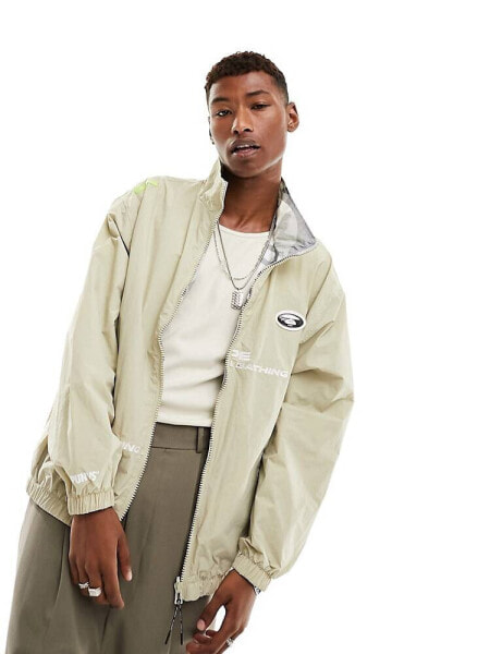 Aape By A Bathing Ape skate reversible oversized track jacket in beige