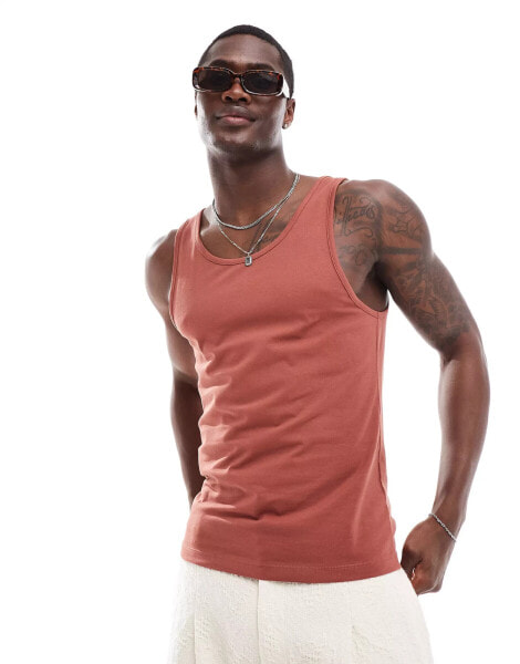 ASOS DESIGN muscle fit vest in brown