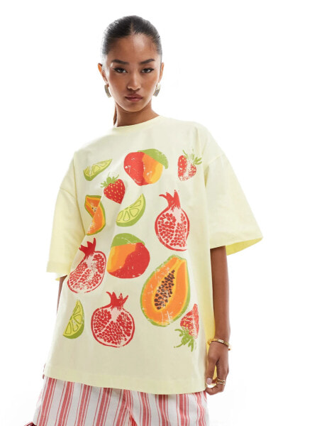 ASOS DESIGN oversized t-shirt with tropical fruit in yellow