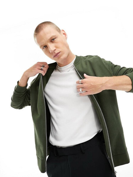 ASOS DESIGN standard jersey bomber jacket in khaki