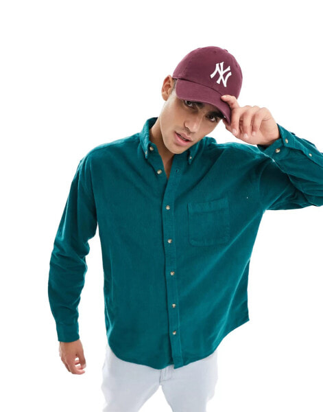 ASOS DESIGN 90s oversized style cord shirt in collegiate green