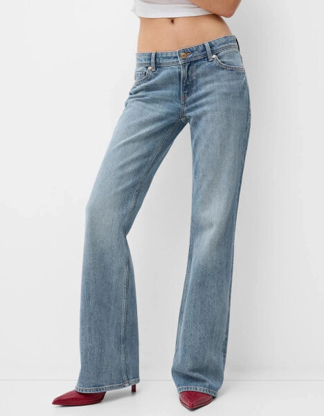 Bershka low rise flared jeans in dark wash blue