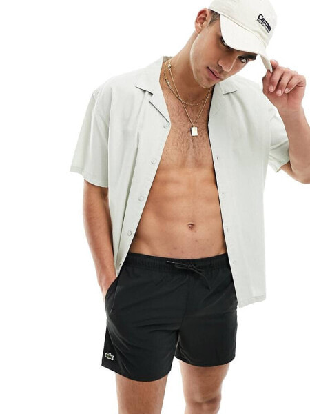 Lacoste logo swim shorts in black