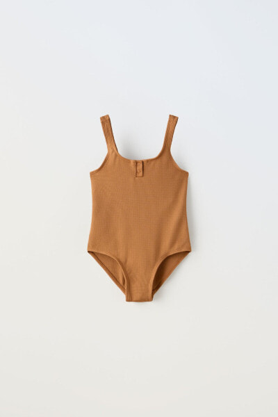 6-14 years/ textured swimsuit