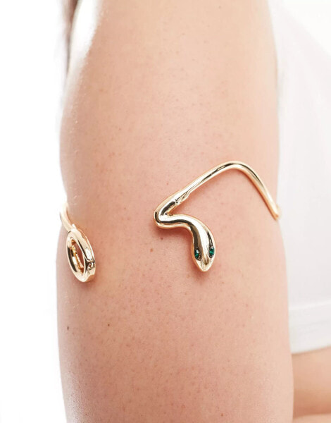 ASOS DESIGN Curve arm cuff with wraparound snake design in gold tone