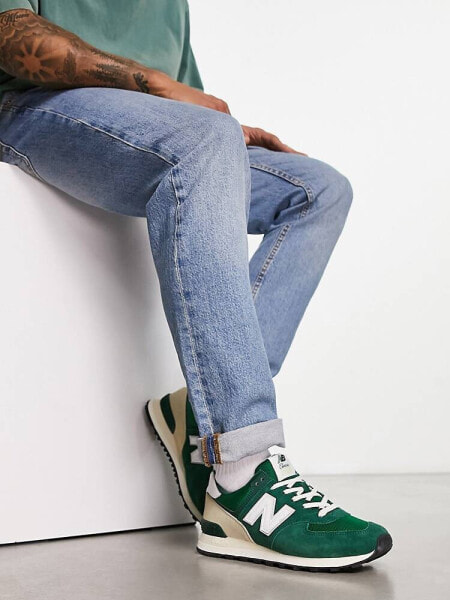 New Balance 574 trainers in dark green