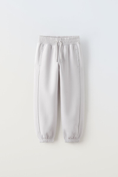 Sporty joggers with shimmery trims