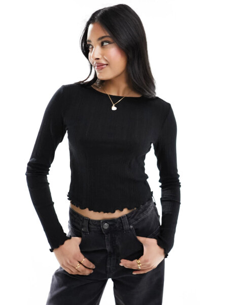 New Look pointelle lettuce hem long sleeve top in black