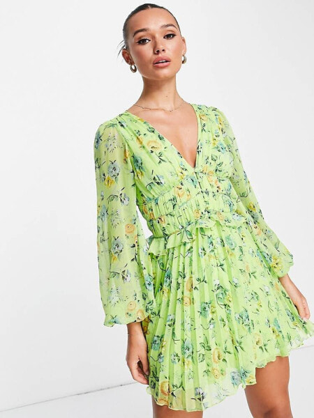 ASOS DESIGN button through ruched waist pleated mini dress in green floral print 