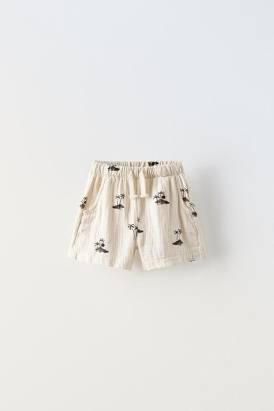 Crepe bermuda shorts with contrast palm trees