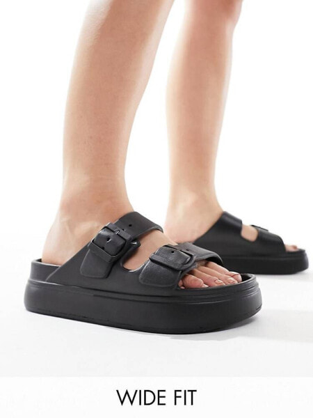 ASOS DESIGN Wide Fit Freestyle flatform double buckle sandals in black