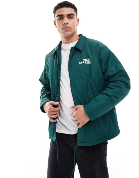 ASOS DESIGN oversized wadded collegiate coach jacket in green with white print