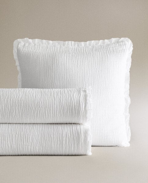 Ruffled muslin bedspread