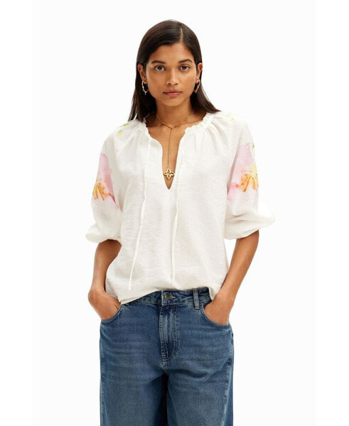 Women's Flowy blouse with watercolor floral print.