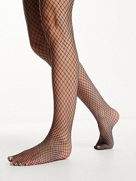 Monki fishnet tights in black