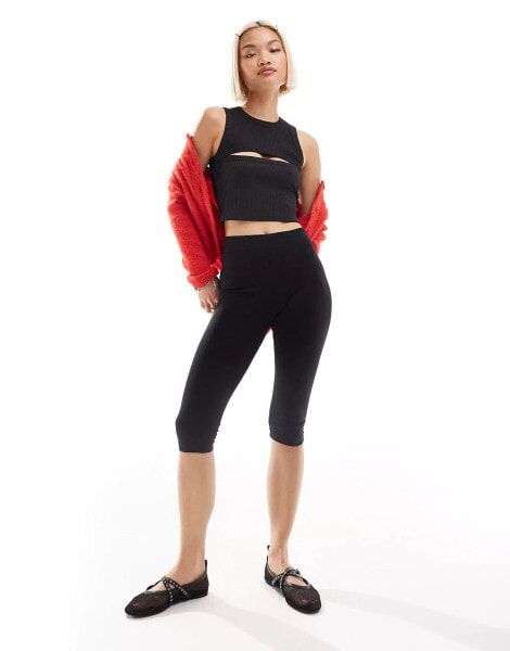 Dr Denim Ainslee sleeveless slim fit cropped tee with cutout chest in off black