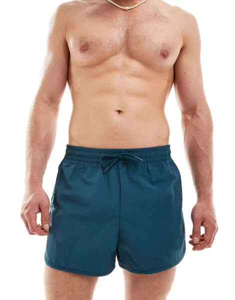 Weekday Tan runner swim shorts in petrol blue