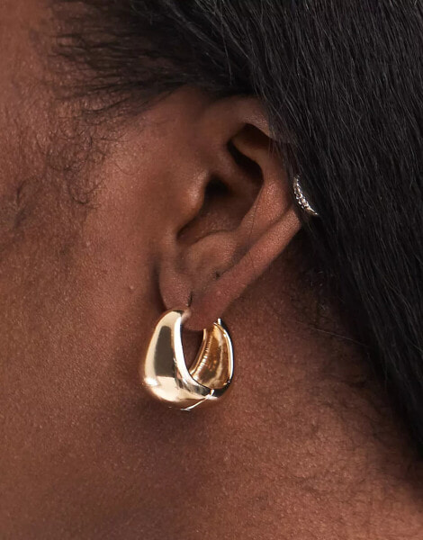 ASOS DESIGN hoop earrings with clicker molten detail in gold tone