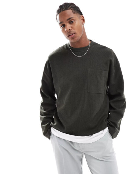 ASOS DESIGN oversized long sleeve t-shirt with front pocket in dark khaki