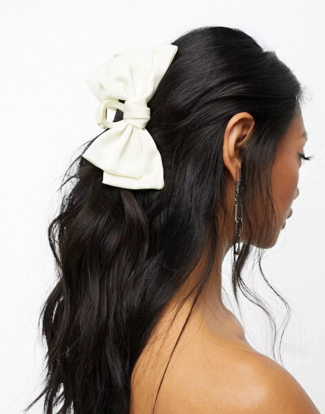 True Decadence bow hair claw in cream