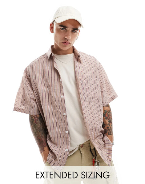 ASOS DESIGN boxy oversized shirt with textured stripe in pink