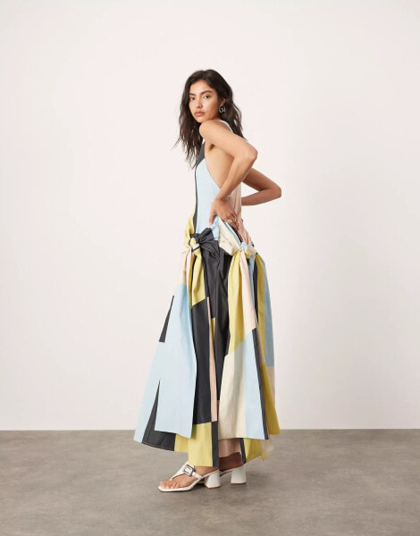 ASOS EDITION racer neck drop waist maxi dress with knot detail skirt in geometric print