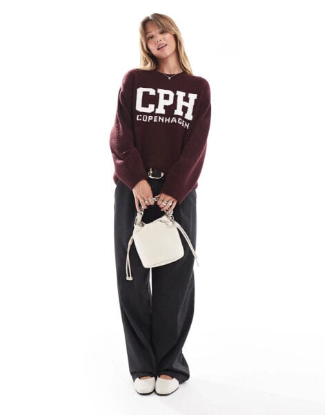 New Look Copenhagen slogan jumper in burgundy