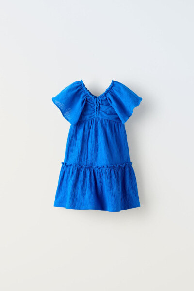 Textured dress with ruffle