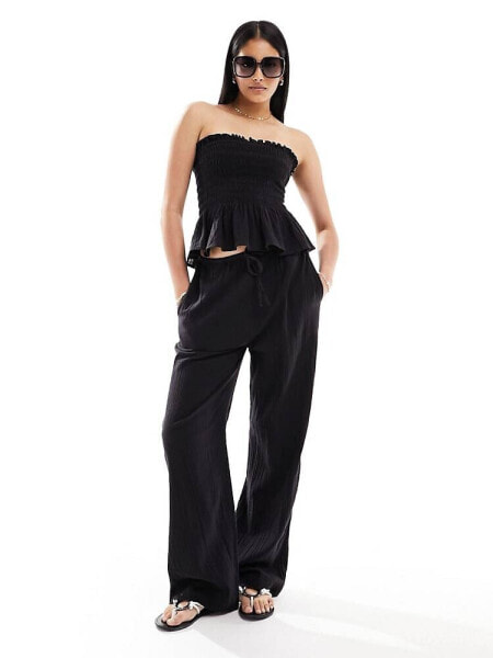 IIsla & Bird narrow waist beach trouser co-ord in black