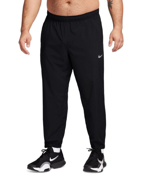Брюки тренировочные Nike Dri-FIT Standard-Fit Tapered-Leg для мужчин
