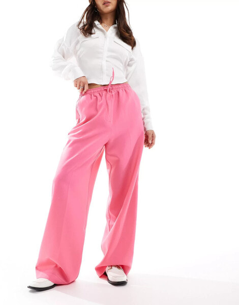 ASOS DESIGN tailored pull on trouser with piping in pink