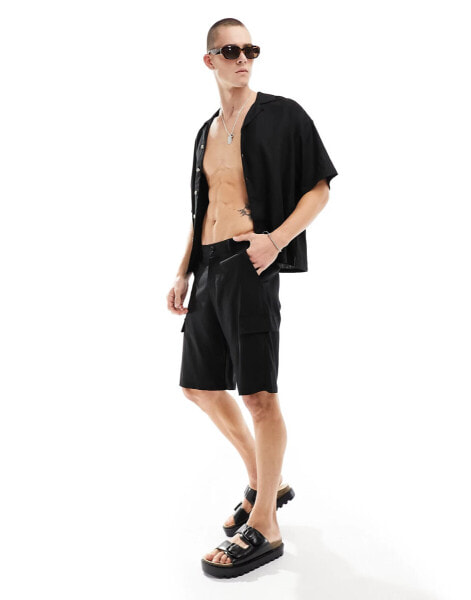 ADPT linen mix cargo short in black