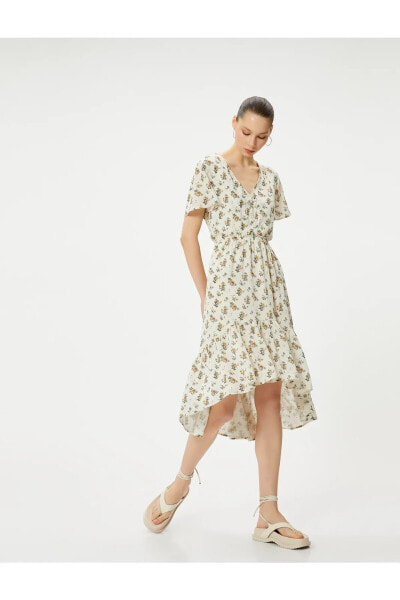 Платье Koton с цветочным узором, асимметричным кроем, оборками, короткими рукавами, V-образным вырезом, застежкой на пуговицы и подкладкой.