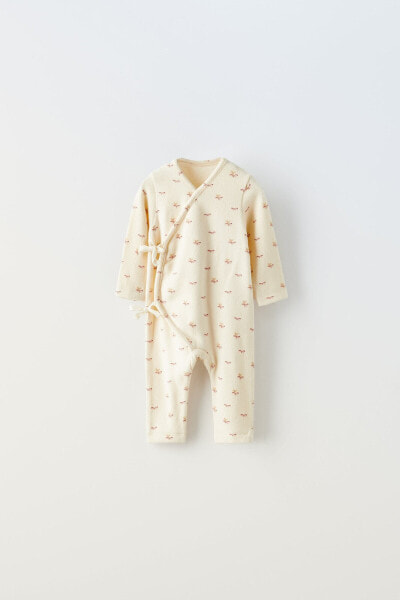 Soft touch jumpsuit with bows and flowers