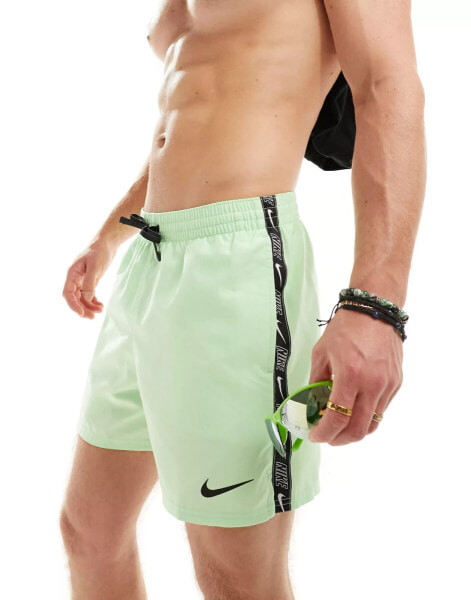 Nike Swimming Logo Tape 5 inch volley swim shorts in vapor green