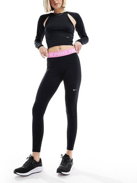 Nike Pro Training 365 mid rise leggings in black and pink