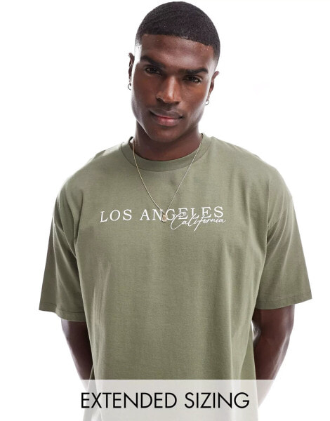 ASOS DESIGN oversized t-shirt in green with front city print