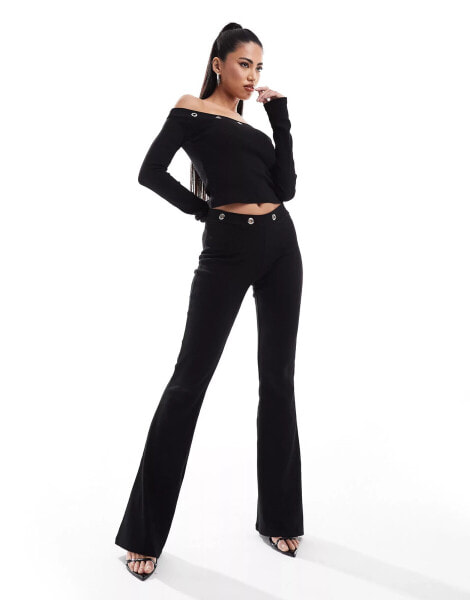 ASOS DESIGN co-ord ribbed flare trousers with eyelet detail in black