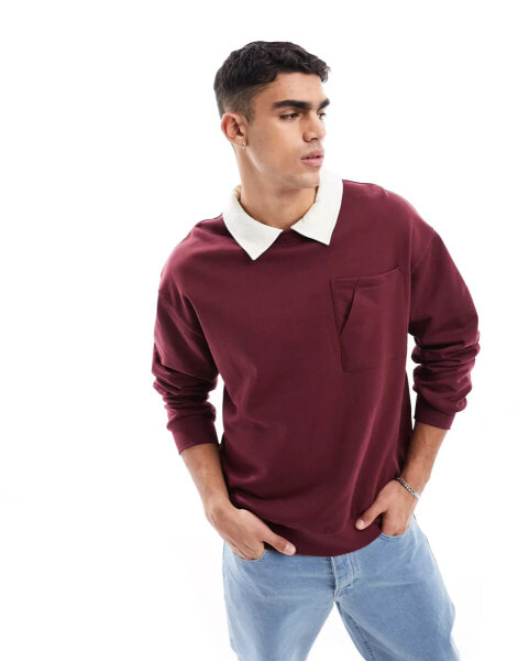 ASOS DESIGN oversized rugby polo sweatshirt with faux collar in burgundy