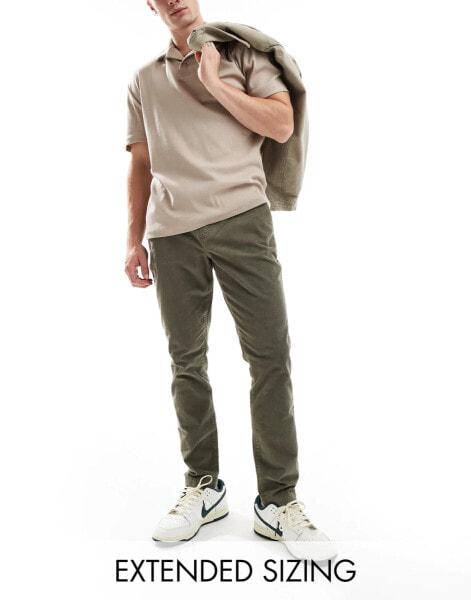 ASOS DESIGN tapered fit corduroy trouser with elasticated waist in khaki