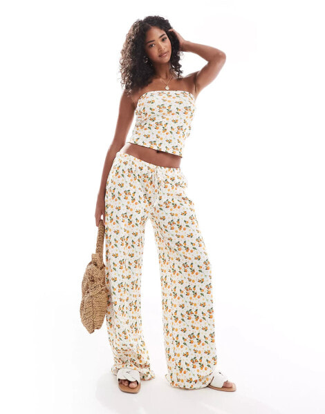 ASOS DESIGN waffle wide leg trouser co-ord in orange fruit print