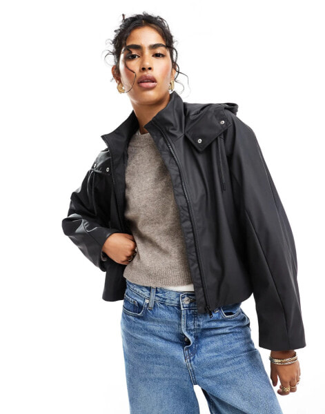 ASOS DESIGN rubberised chuck on rain jacket with pocket detail in black