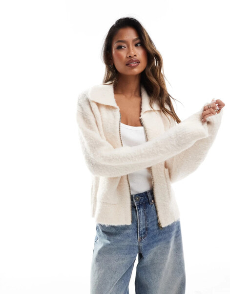 In The Style knitted zip through pocket detail cardigan in cream