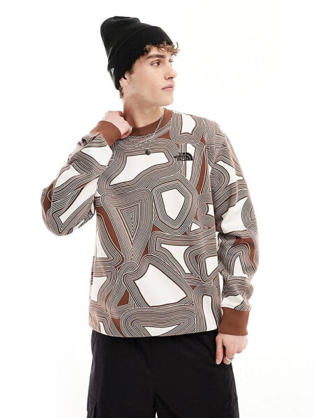 The North Face Essential oversized fleece sweatshirt in brown geo print Exclusive at ASOS