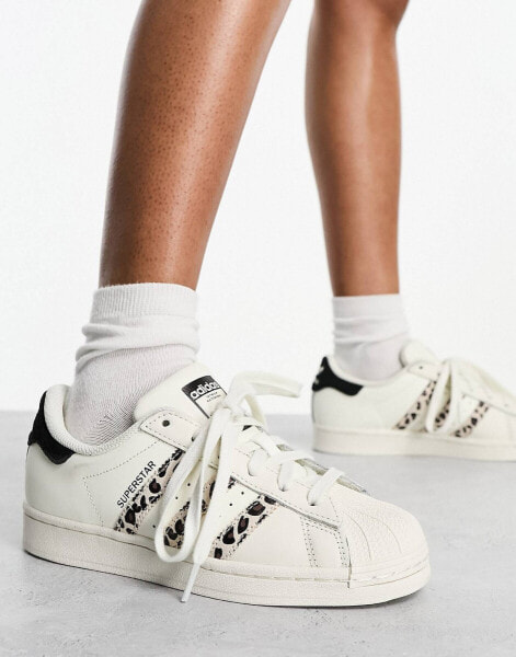 adidas Originals Superstar trainers in off white leopard